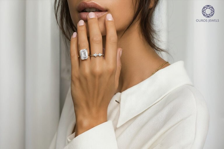 Woman wearing two lab grown diamond rings in a minimal, modern style