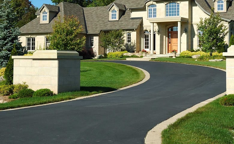 What Sits Under Your Driveway Matters More Than You Think: Drainage, Ground Prep, and Asphalt Driveways in Melbourne