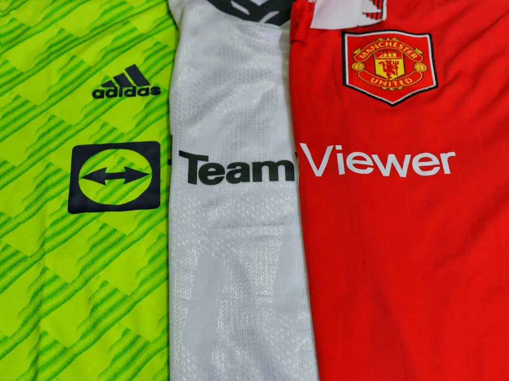 The History Behind Football Shirt Designs: From Stripes to Sponsors